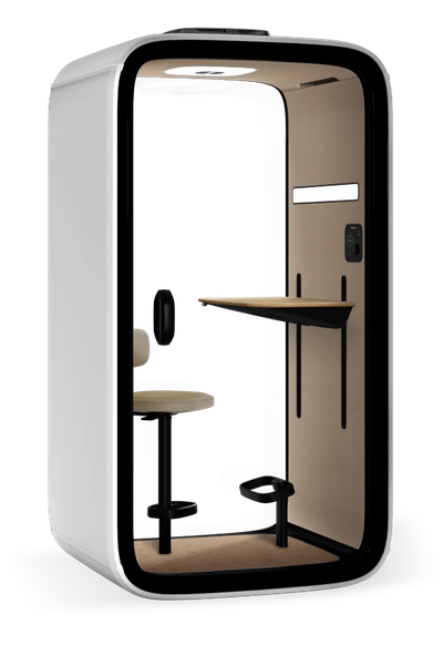 Modern, enclosed workspace pod with a seat and foldable desk.