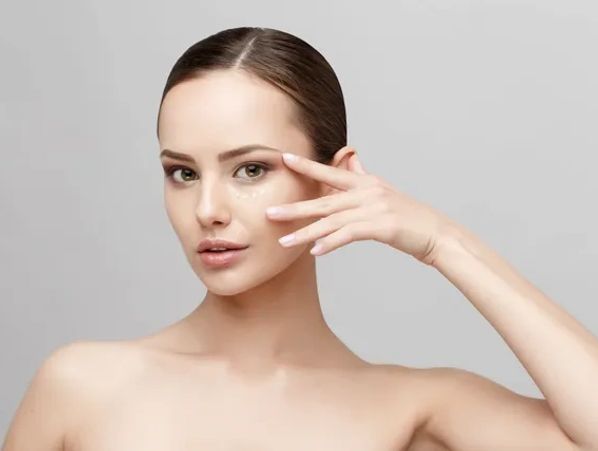 Woman showing her glowing face after treatment