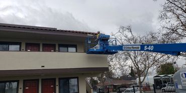 White house exterior repaint with ladder, San Jose, CA (Bay Area)