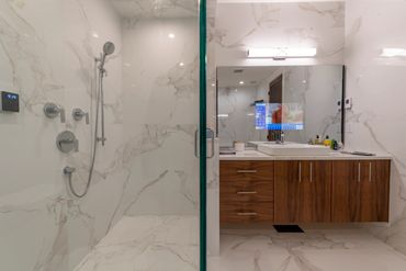 Floating walnut bathroom vanity