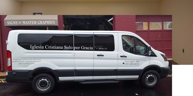 Church Vans lettered cheaply.