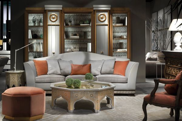Elegant living room with beige and orange decor.
