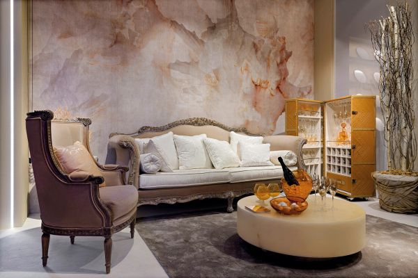 Elegant vintage living room with beige sofa and armchair.