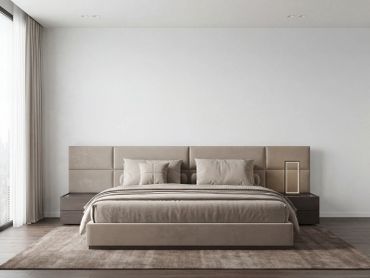 Minimalist beige bedroom with modern lighting and soft textures.