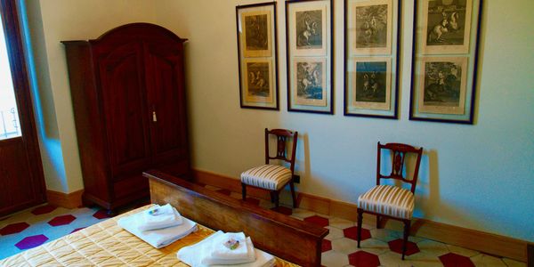 Exquisite antiques in one of the three bedrooms of this holiday rental apartment in Sulmona, Italy