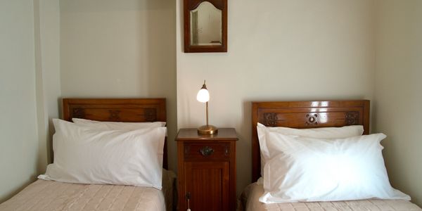 Elegant twin bedroom in a three bedroom holiday rental apartment in Sulmona, Abruzzo, Italy