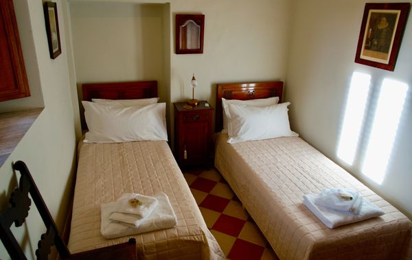 Antiques, twin beds, modern amenities, twin bedroom, tastefully furnished holiday apartment, sulmonaa