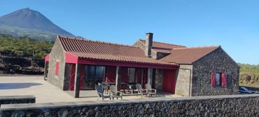 Spectacular sunset over Pico's coastline