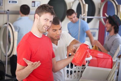 guy confused by laundry detergent