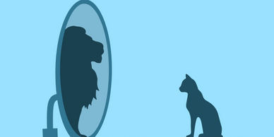 A cat sees a lion reflection in a mirror, symbolizing self-perception.