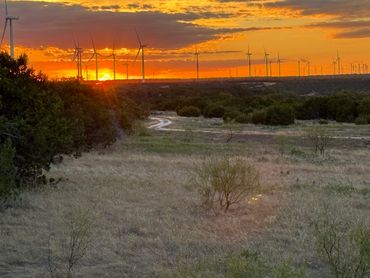 WEST TEXAS SUNSET WITH WINDMILL TURBINES