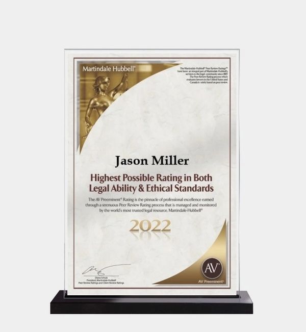 Award plaque for Jason Miller's highest legal and ethical rating in 2022.