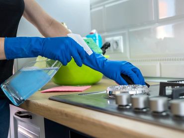 Stove-top and kitchen cleaning.