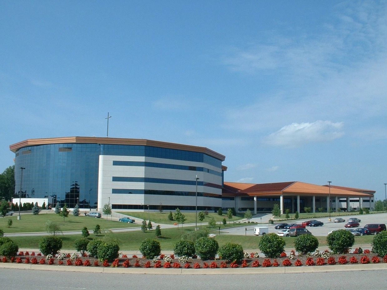 Modern church building with a cross on top.