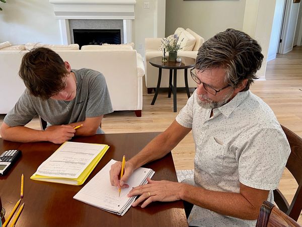 Mr. Jolly teaching the student