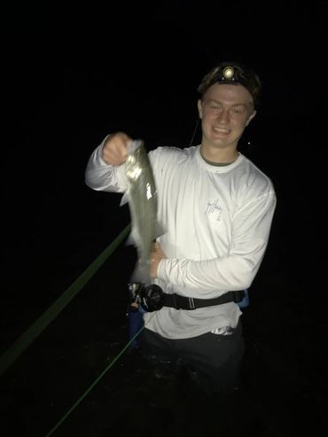 Lawton Crooks with his first striper on the fly  caught on a black bling beastmater fly