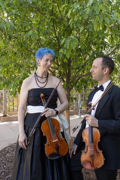 Krista Swider with her viola and Jeremy Swider with his violin: The Broadway Swider Duo from Sonorou