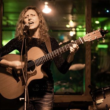 Tamara Hey performing at Pianos, New York City. Photo by Drew Weidemann.