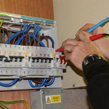 A person fixing a switch