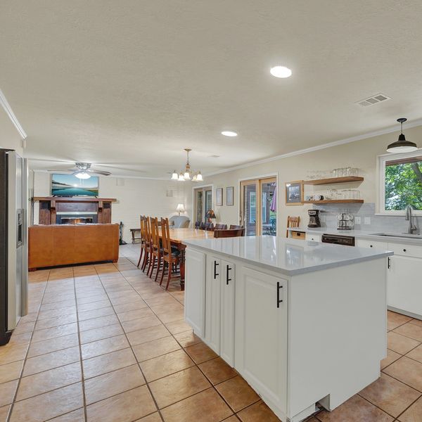 Spacious kitchen and dining area with a large island.