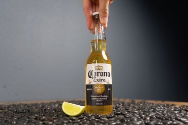 Our large selection of beer including a cold Corona with a wedge of lime served in Orlando, Florida