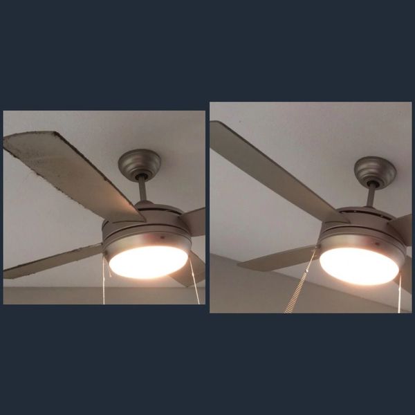 Cleaning years of dust buildup on ceiling fans.