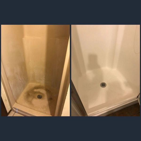 Shower enclosure deep cleaned and now sparkling clean.