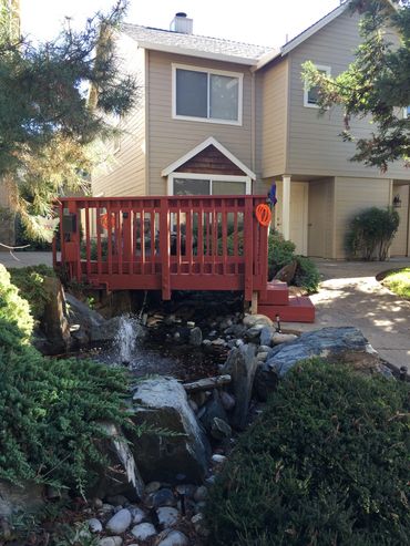 Greenwood Place’s foot bridge of a beautiful water feature in Cameron Park CA