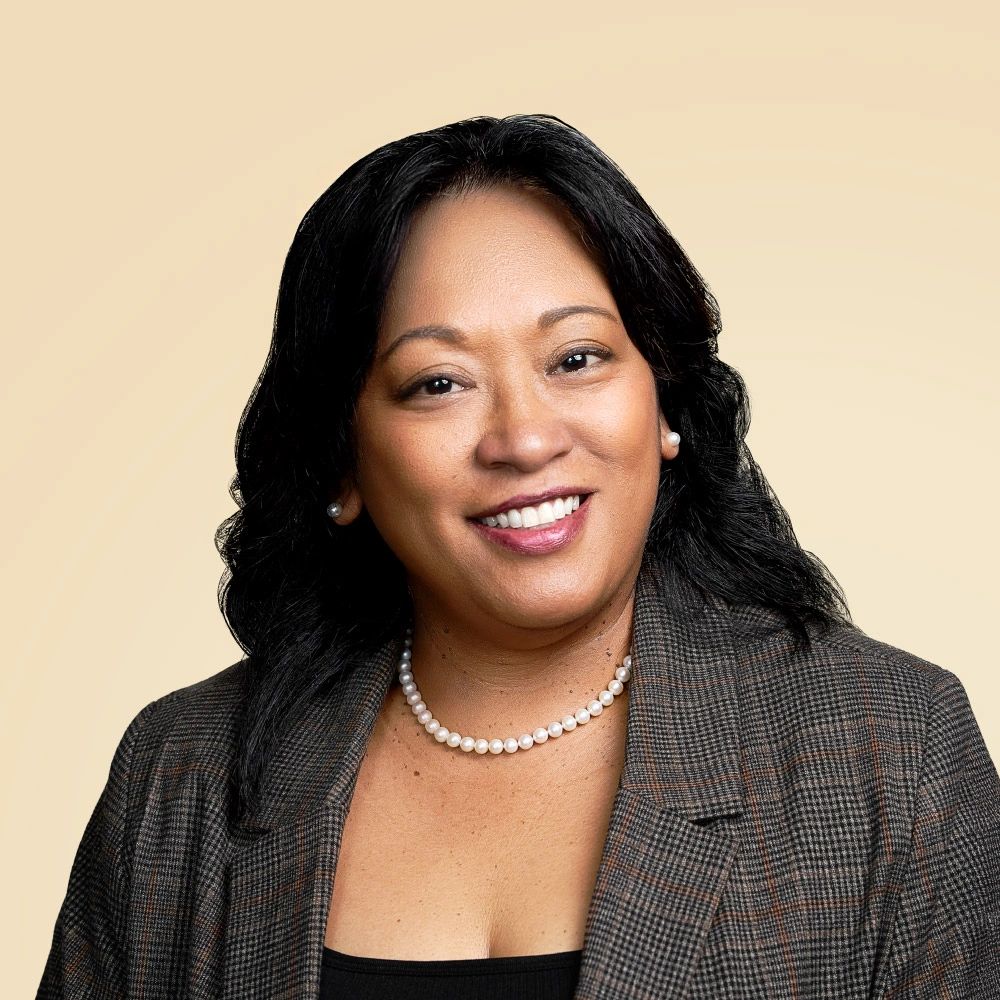 Headshot of Angelica smiling at camera.