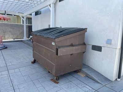 3‑yard dumpster ideal for small household junk and yard waste