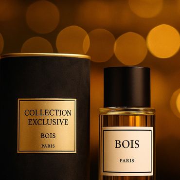 Bois Paris Collection Exclusive perfume bottle and packaging with warm golden bokeh background.