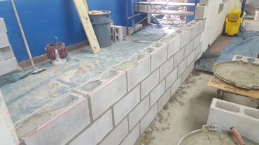 reinforcement, block and toothing