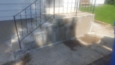 Concrete steps and walkway in major need of repair in Hartford CT. Existing railing will be cut at t