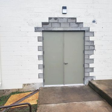 Steel double doors installed and a new extra wide access to the building is complete