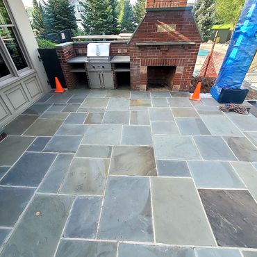 The existing exterior fireplace has cracking and deterioration due to the elements. This structure w