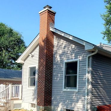 New wood stove brick chimney constructed.
Brick type is Glen Gery Red Matt