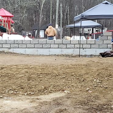 Split faced decorative block is used for the first 8 courses with extensive steel vertical and horiz