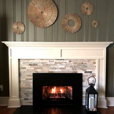 New fireplace facelift complete . Our customer was extremely happy with the finished product and req