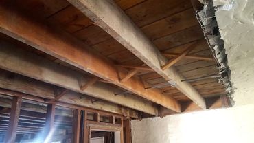 Water damage on ceiling and walls - This is a home built in the early 1900s with thick plaster with