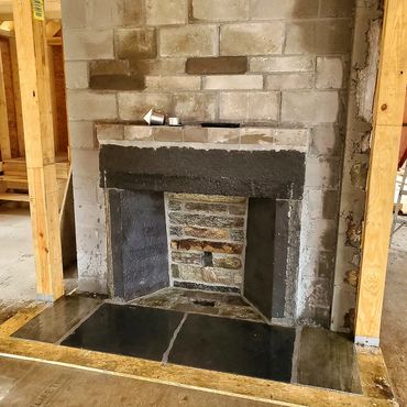 Fireplace side walls and lintel also reclaimed from an 1800's old house demolition