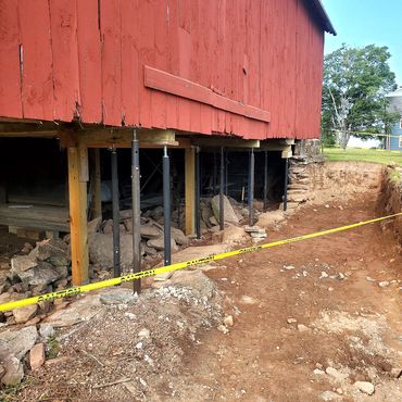 Removal of the old existing crumbling stone foundation