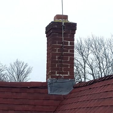 This chimney is leaking and will be rebuilt in the Spring. In the meantime, it needs to be weatherpr