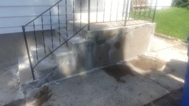 Concrete steps and walkway in major need of repair in Hartford CT. Existing railing will be cut at t