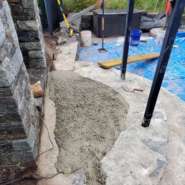 Concrete repair for base of stone landing rebuild