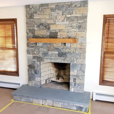 Thin Stone veneer fireplace facelift complete - beautiful