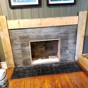 Wire lath is installed, the new opening for the insert is created and the old bricks are plastered a