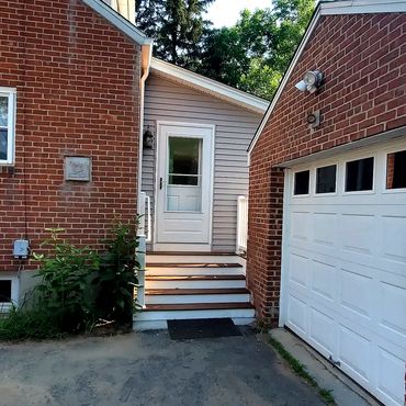 Grand entrance from driveway to the new 900 square foot farmhouse addition