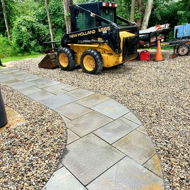 New bluestone walkway set on stone dust