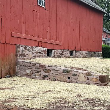 Strong Family Farm Post & Beam Red barn brownstone foundation and retaining wall restoration project