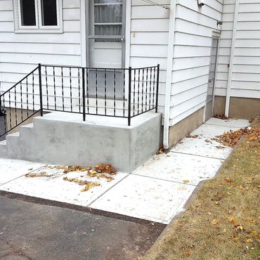 New concrete steps, landing, rails and walkway